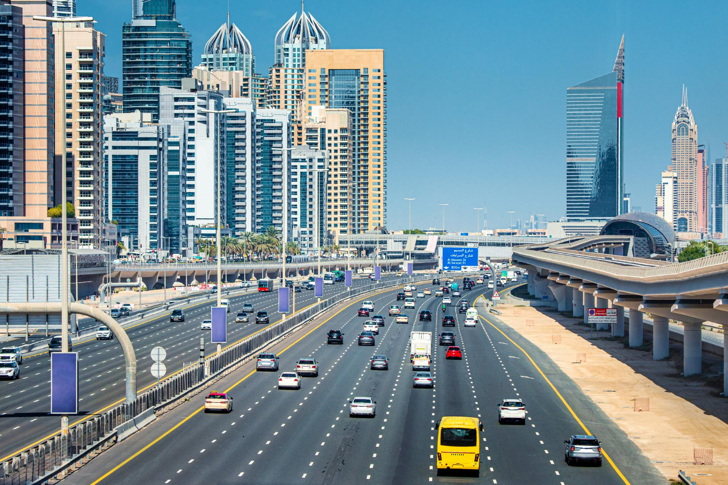 Dubai traffic on Sheikh Zayed Road with city skyline, used for a guide on checking and paying Dubai traffic fines